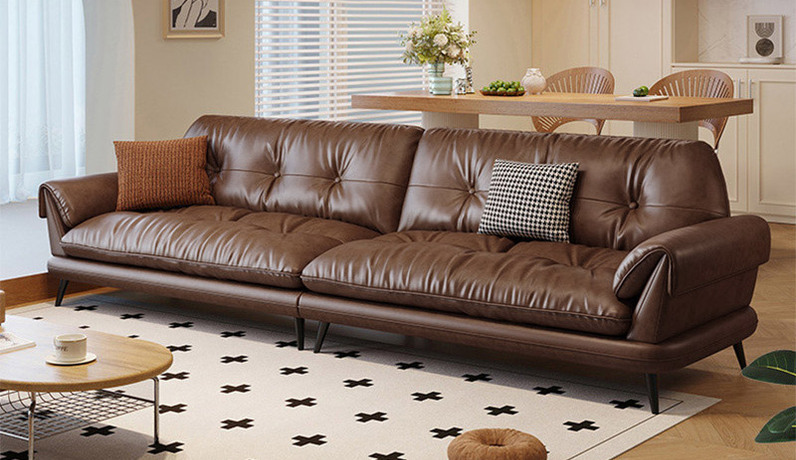 诺美帝斯 意式极简 云屿沙发 流水皱工艺 天然纹理 耐磨抗撕拉仿真皮 甄选优质蓬松羽绒抱枕 高密度无粉回弹海棉 全实木框架 中古风四人沙发