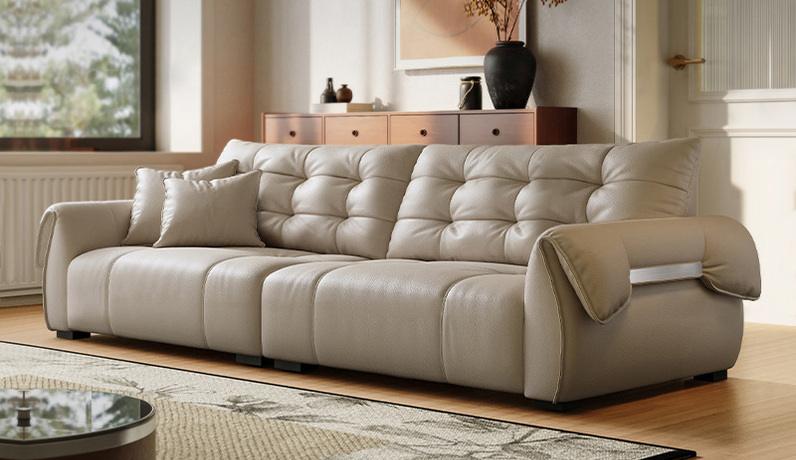 欧瑞仕 意式极简 天鹅真皮沙发 高定头层黄牛皮 优雅天鹅颈曲线扶手造型流畅立体 微倾靠背撑腰不悬空 厚实软弹大坐包 云感高密度海绵Q弹舒适 深拉点工艺弧度饱满 进口俄罗斯落叶松实木框架 大四人位沙发