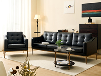 汉森庄园 英伦风 进口实木微雕工艺 设计感深浅光影变化 柔软舒适油蜡仿真皮 切斯菲尔德纽扣元素 弧线形窄边扶手 阿尔贝托雕塑金属高脚 沙发组合 单人位+三人位